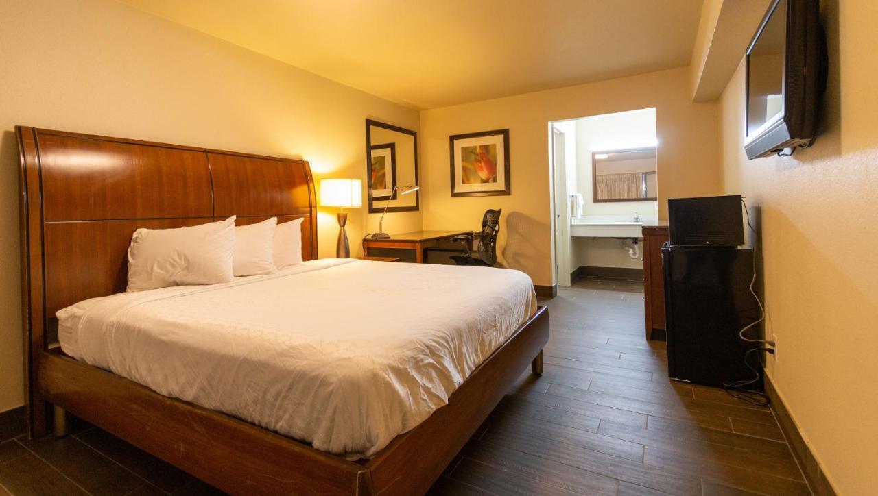 Magnuson Extended Stay And Suites Airport Hotel Ървинг Екстериор снимка