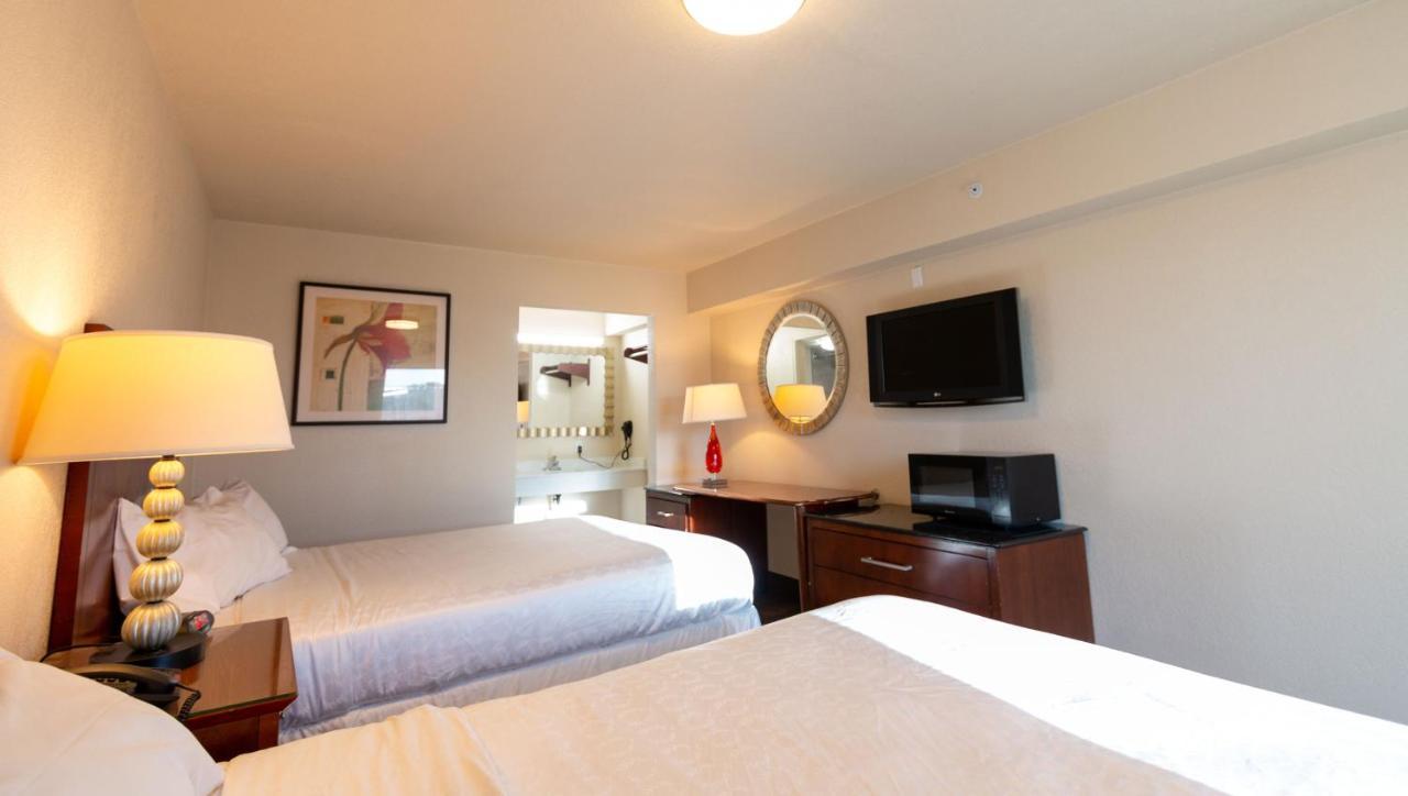 Magnuson Extended Stay And Suites Airport Hotel Ървинг Екстериор снимка